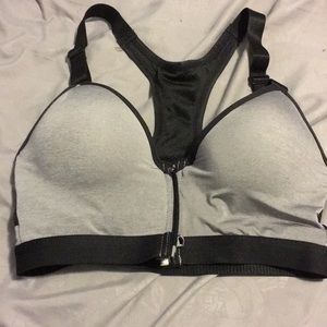 Grey and black zip up sports bra